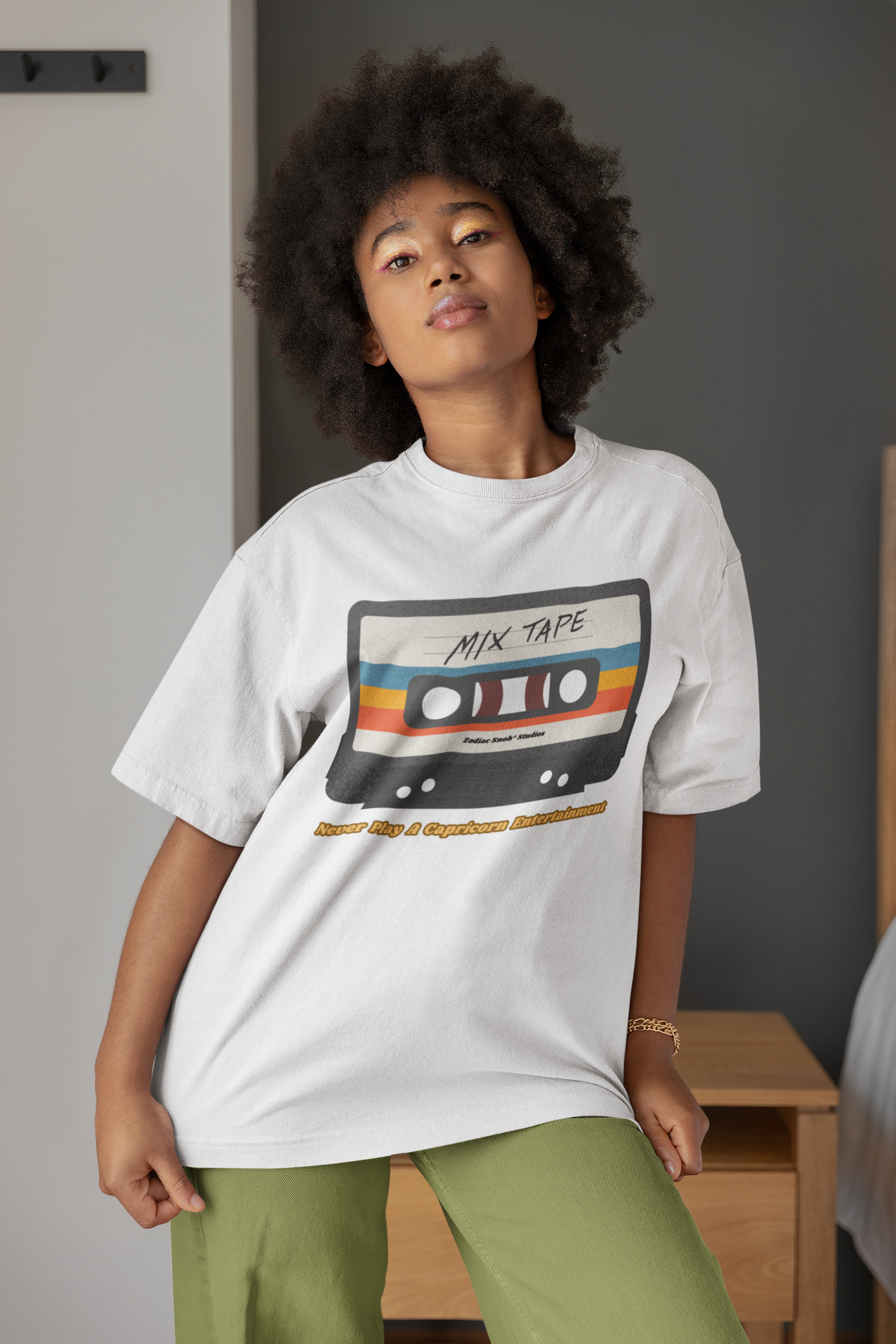 Unisex Oversized Mix Tape Tee: Never Play A Capricorn Entertainment